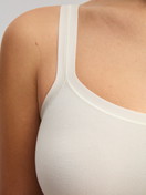 Women model is wearing Spaghetti top made of Modal in White, Unicoloured from the Seamless Natural series by CALIDA, Detail