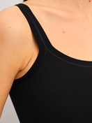 Women model is wearing Spaghetti top made of Modal in Black, Unicoloured from the Seamless Natural series by CALIDA, Detail