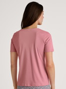Le mannequin Femme porte le/la T-Shirt à manches courtes en 100% coton de couleur Rose, Unicolore, de la série Favourites Ground de CALIDA, Vue arrière