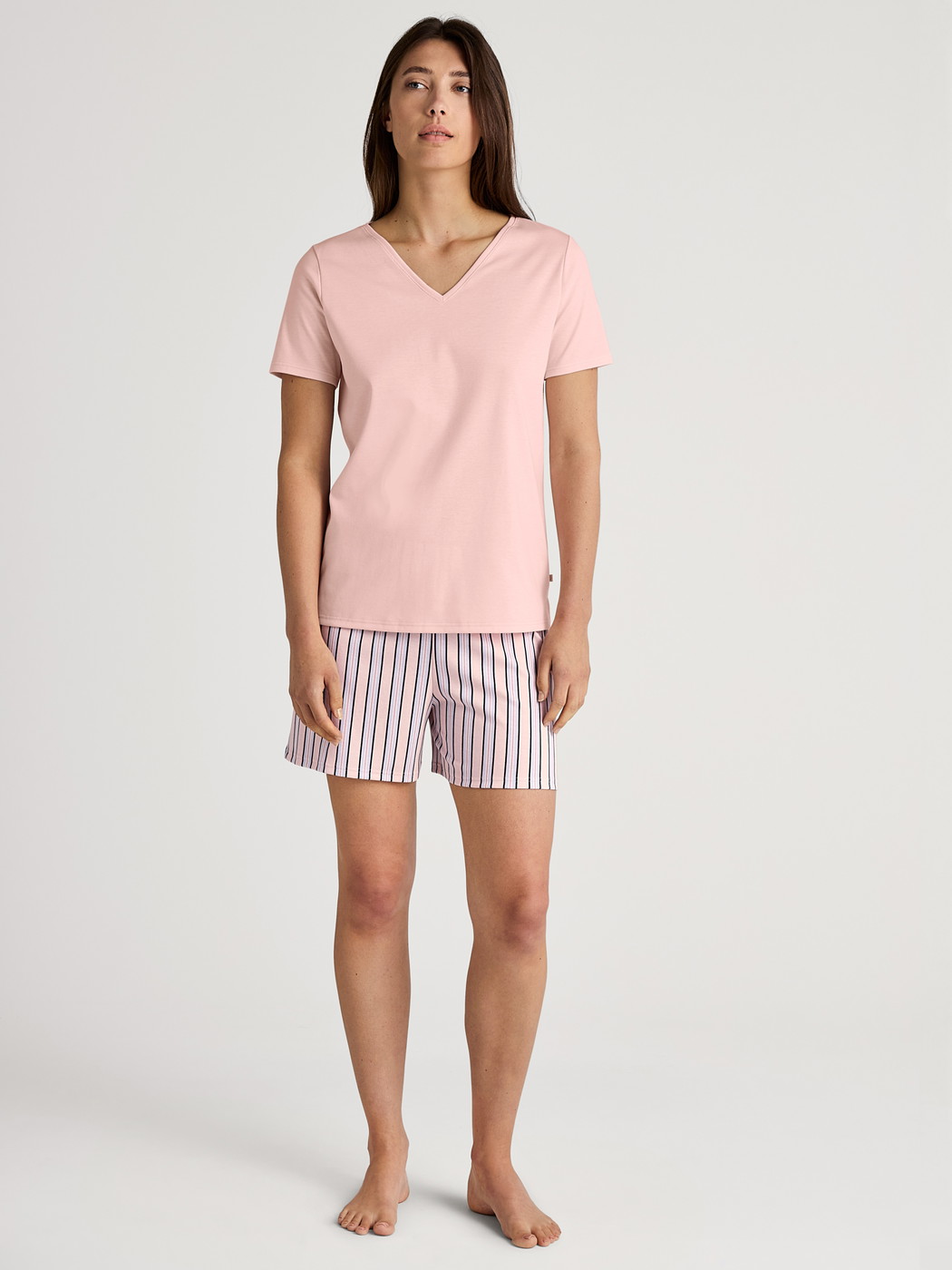 Women model is wearing Short-sleeved shirt made of 100% Cotton in Pink, Unicoloured from the Favourites Sleep series by CALIDA, Outfit