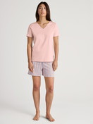 Women model is wearing Short-sleeved shirt made of 100% Cotton in Pink, Unicoloured from the Favourites Sleep series by CALIDA, Outfit