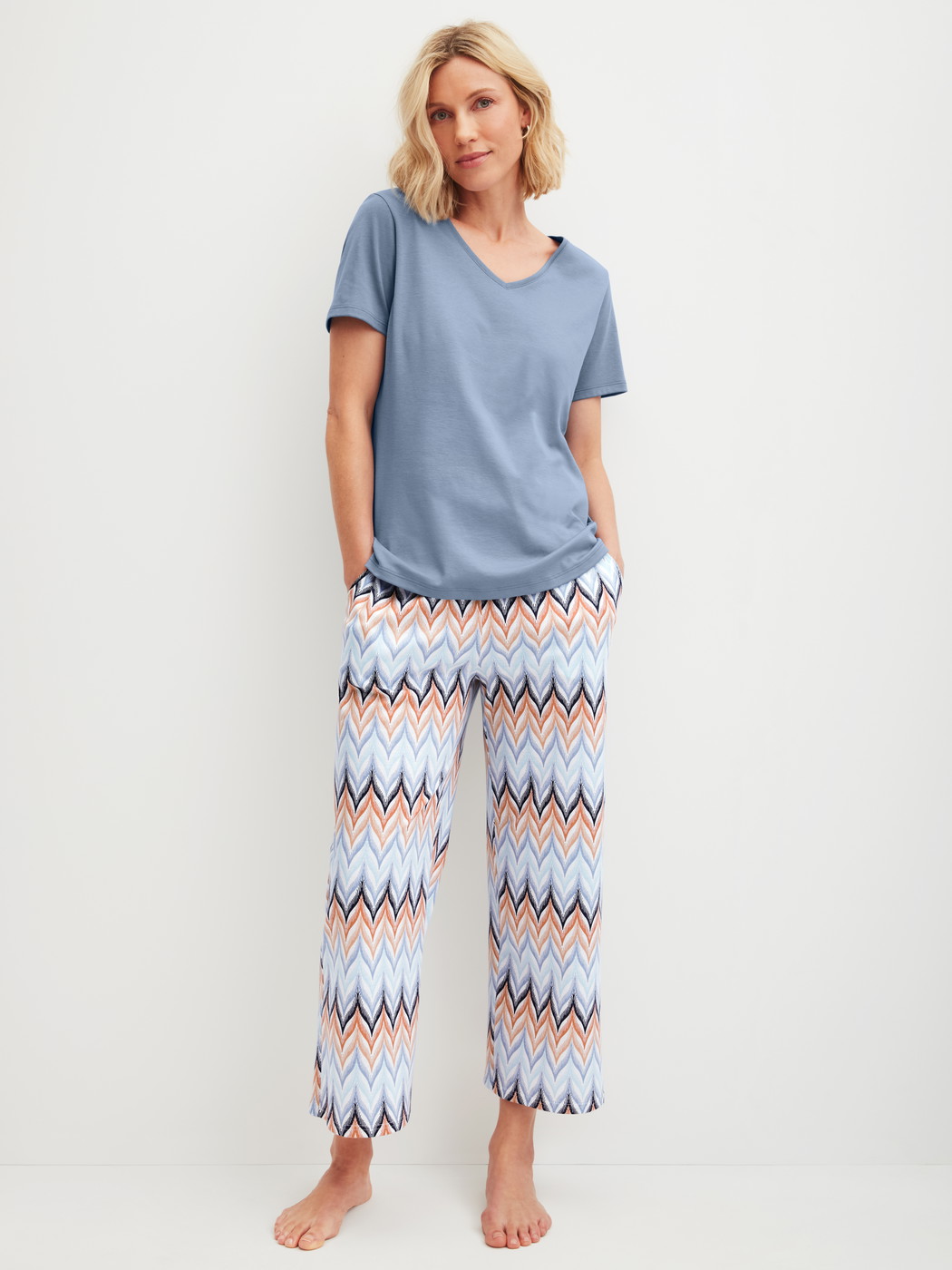 Women model is wearing Short-sleeved shirt made of 100% Cotton in Blue, Unicoloured from the Favourites Tiles series by CALIDA, Outfit