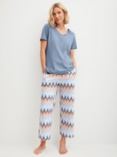 Women model is wearing Short-sleeved shirt made of 100% Cotton in Blue, Unicoloured from the Favourites Tiles series by CALIDA, Outfit