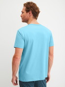 Men model is wearing Short-sleeved shirt made of 100% Cotton in Blue, Unicoloured from the RMX Sleep Leisure series by CALIDA, Back view