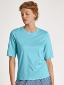 Le mannequin Femme porte le/la T-Shirt à manches courtes en Modal de couleur Turquoise, Unicolore, de la série Favourites Energy de CALIDA, Vue de face