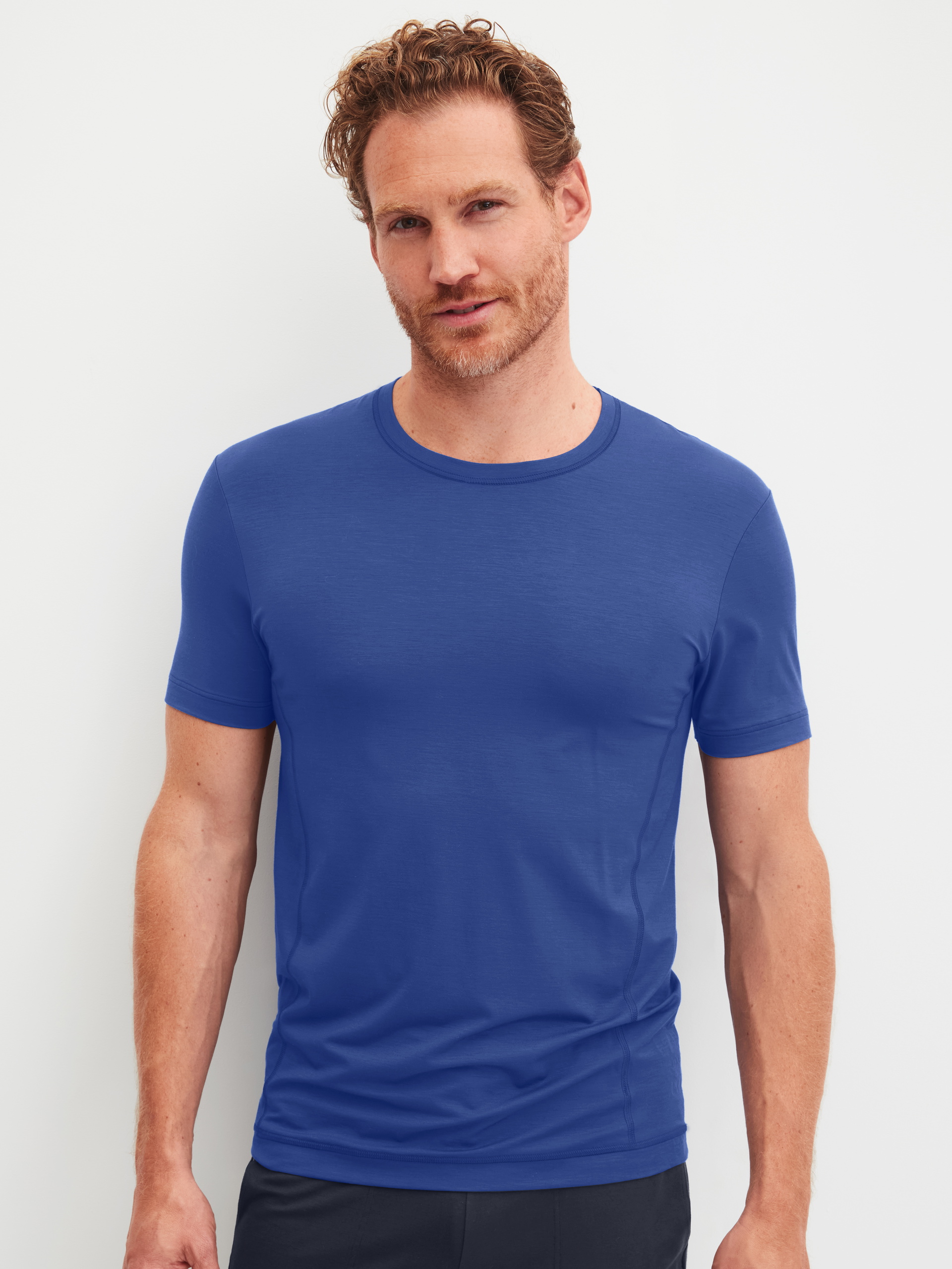 Men model is wearing Shirt short sleeve made of Modal in Blue, Unicoloured from the DSW Balancing series by CALIDA, Front view
