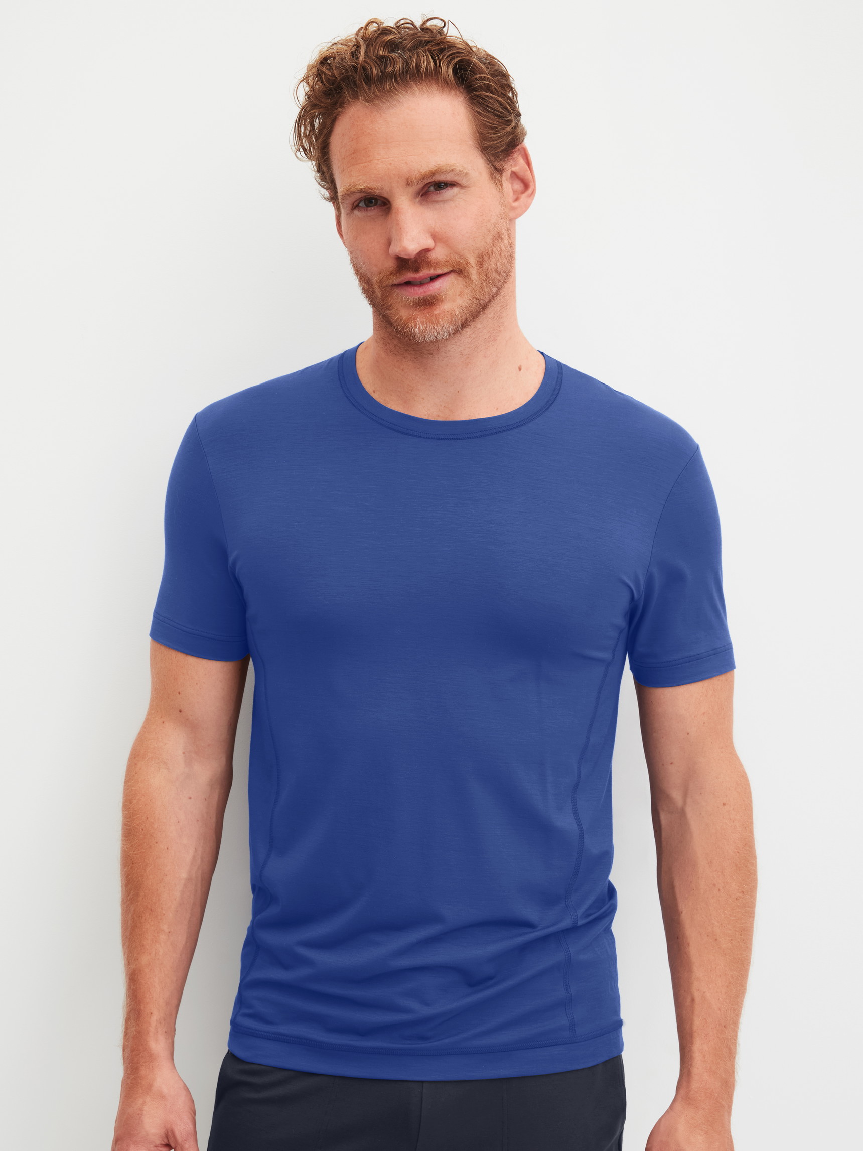 Men model is wearing Shirt short sleeve made of Modal in Blue, Unicoloured from the DSW Balancing series by CALIDA, Front view