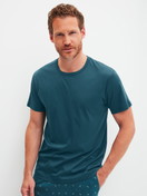 Men model is wearing Short-sleeved shirt made of Pima® Cotton in Turquoise, Unicoloured from the RMX Sleep Free series by CALIDA, Front view