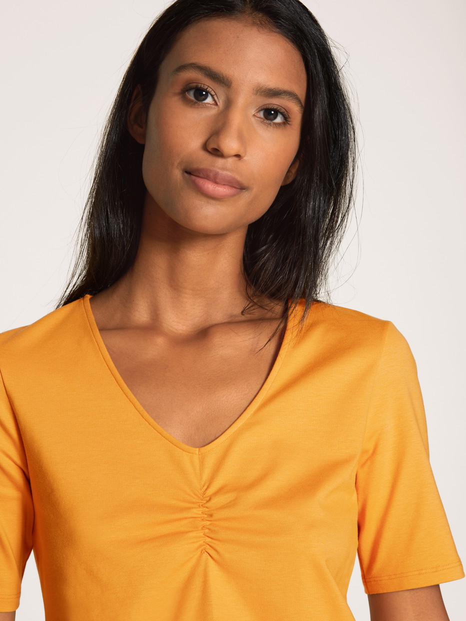Damen - Kurzarm-Shirt aus Baumwolle in Gelb, Einfarbig aus Serie Favourites Sunflower von CALIDA, Detail