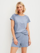 Women model is wearing Shirt short sleeve made of Lyocell in Blue, Unicoloured from the DSW Cooling series by CALIDA, Outfit