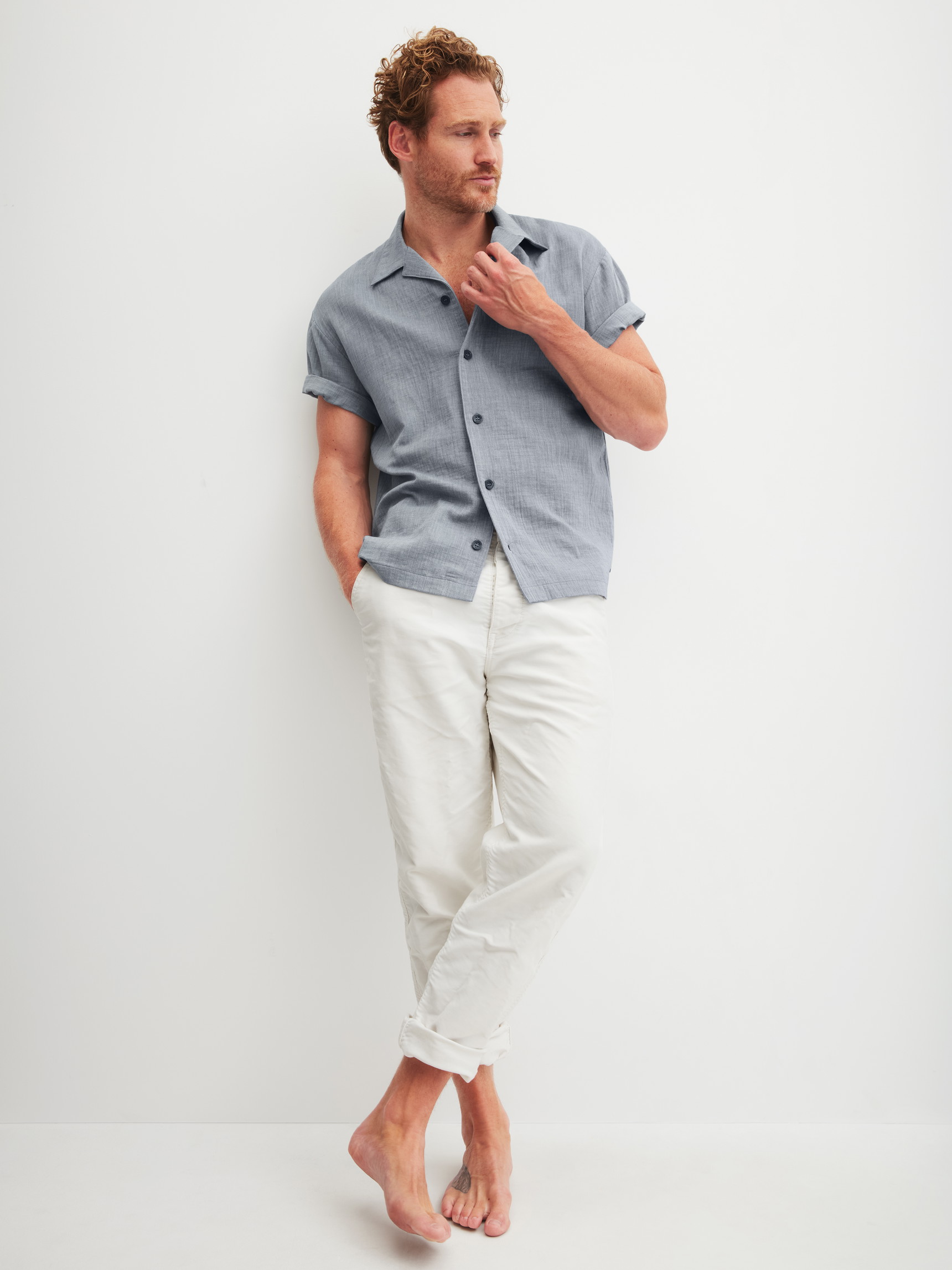 Men model is wearing Short shirt with button facing made of 100% Cotton in Grey, Unicoloured from the RMX Sleep Journey series by CALIDA, Additional Image