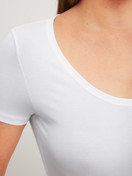 Women model is wearing Shirt short sleeve made of Modal in White, Unicoloured from the Soft Favourites series by CALIDA, Detail