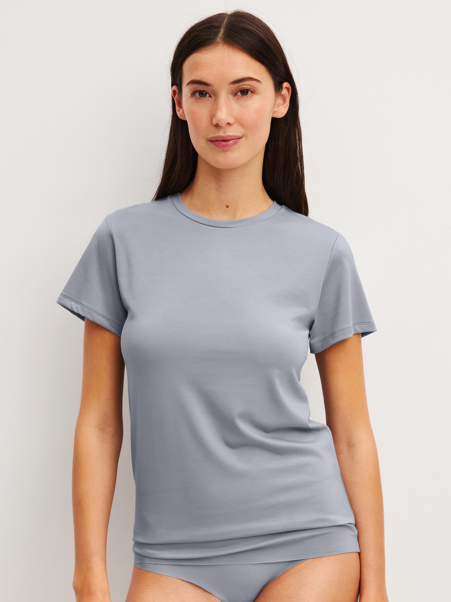 Women model is wearing Shirt short sleeve made of Modal in Grey, Unicoloured from the Natural Skin series by CALIDA, Front view