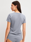 Women model is wearing Shirt short sleeve made of Modal in Grey, Unicoloured from the Natural Skin series by CALIDA, Back view