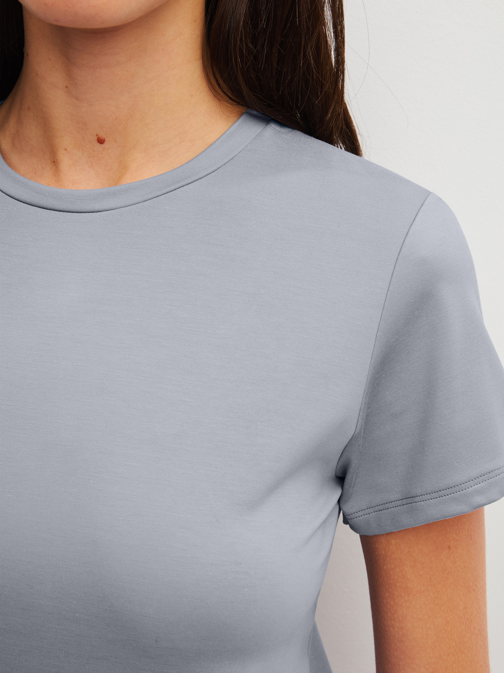 Women model is wearing Shirt short sleeve made of Modal in Grey, Unicoloured from the Natural Skin series by CALIDA, Detail