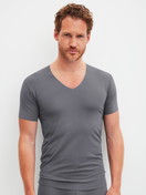 Men model is wearing V-shirt made of Modal in Grey, Unicoloured from the Clean Line series by CALIDA, Front view