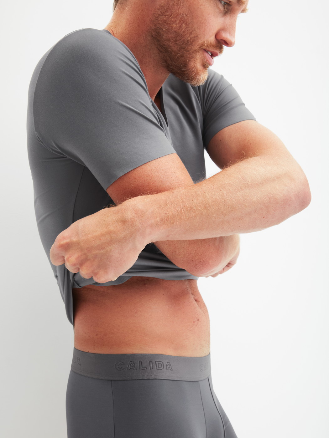 Men model is wearing V-shirt made of Modal in Grey, Unicoloured from the Clean Line series by CALIDA, Additional Image