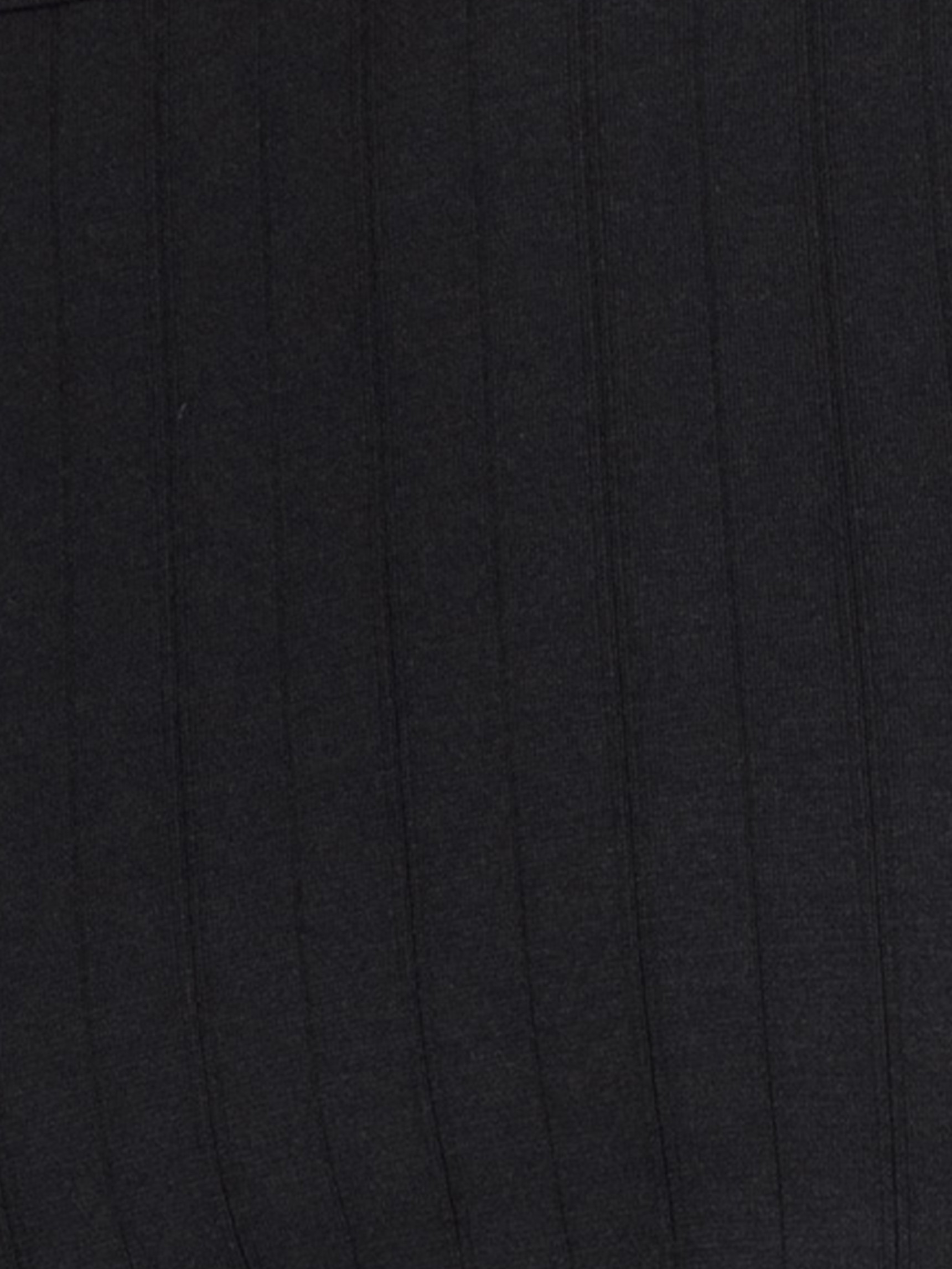 Le mannequin Homme porte le/la T-shirt en Coton de couleur Noir, Unicolore, de la série Pure & Style de CALIDA, Détail