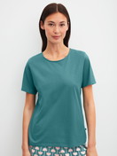 Damen-Model trägt Kurzarm-Shirt aus 100% Baumwolle in Türkis, Einfarbig aus Serie Favourites Beach von CALIDA, Vorderansicht