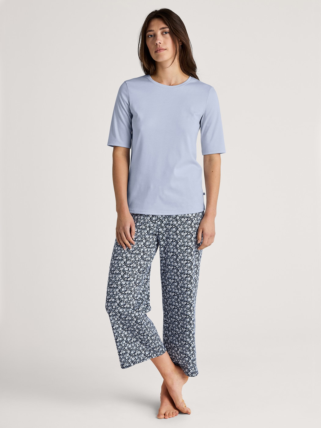 Women model is wearing Short-sleeved shirt made of 100% Cotton in Blue, Unicoloured from the Favourites Sleep series by CALIDA, Outfit