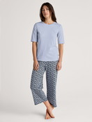Women model is wearing Short-sleeved shirt made of 100% Cotton in Blue, Unicoloured from the Favourites Sleep series by CALIDA, Outfit