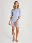 Women model is wearing Short-sleeved shirt made of 100% Cotton in Blue, Unicoloured from the Favourites Sleep series by CALIDA, Additional Image