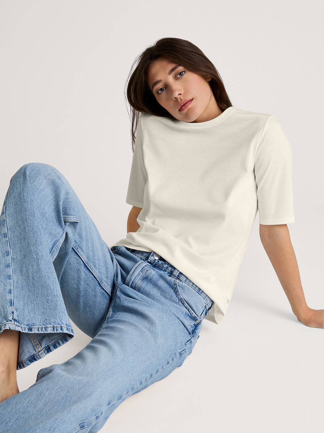 Women model is wearing Short-sleeved shirt made of 100% Cotton in White, Unicoloured from the Favourites Sleep series by CALIDA