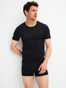 Men model is wearing  made of Polyamide in Black, Unicoloured from the Micro Stretch series by CALIDA, Outfit