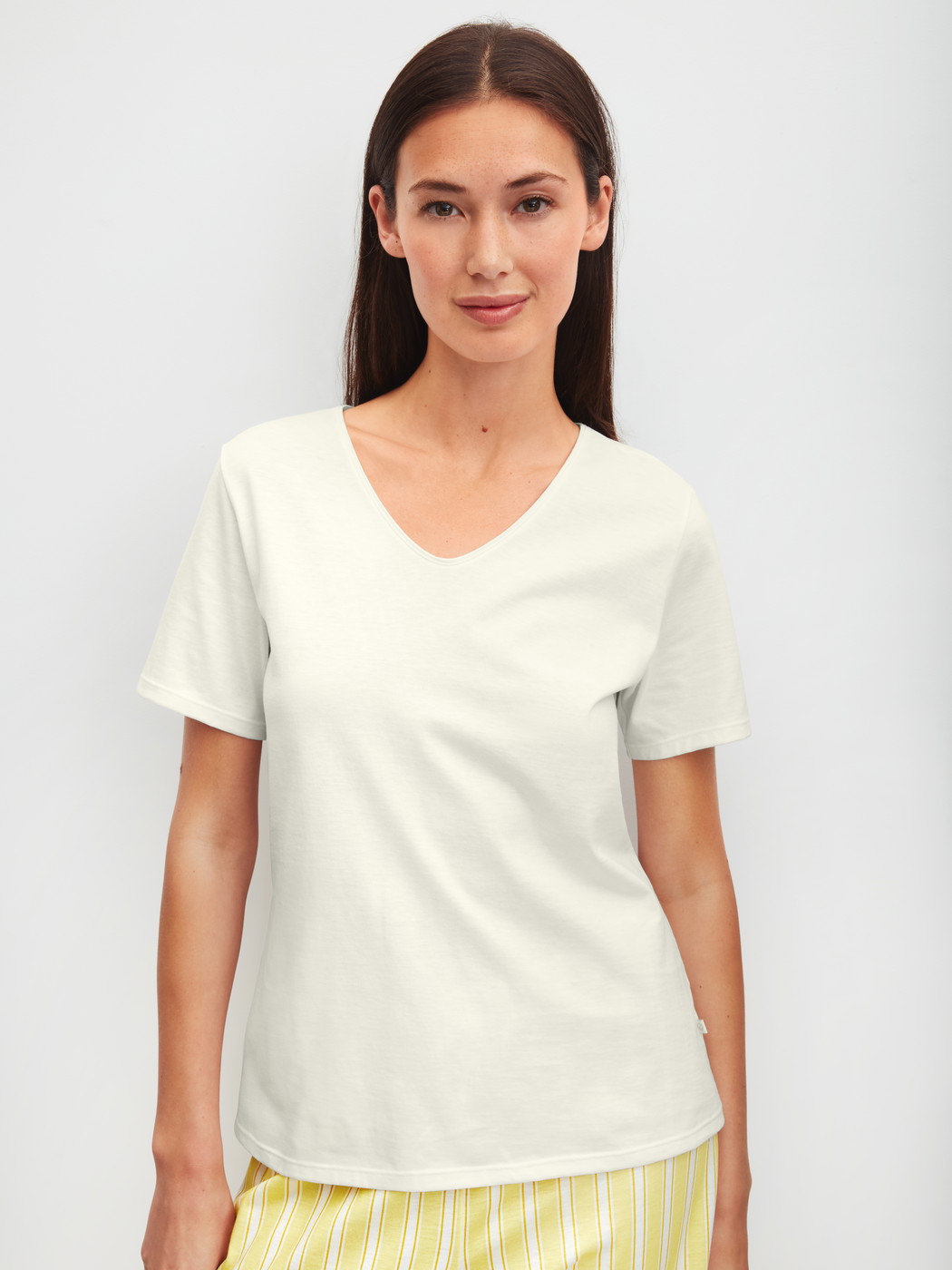 Women model is wearing Shirt shortsleeve made of 100% Cotton in White, Unicoloured from the Favourites Ocean series by CALIDA, Front view