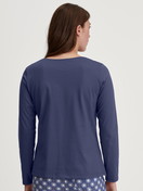 Women model is wearing Shirt long sleeve made of 100% Cotton in Blue, Unicoloured from the Favourites Universe series by CALIDA, Back view