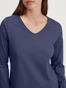 Women model is wearing Shirt long sleeve made of 100% Cotton in Blue, Unicoloured from the Favourites Universe series by CALIDA, Detail