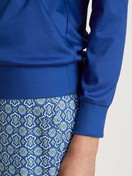Women model is wearing Shirt long sleeve made of 100% Cotton in Blue, Unicoloured from the Favourites Energy series by CALIDA, Detail