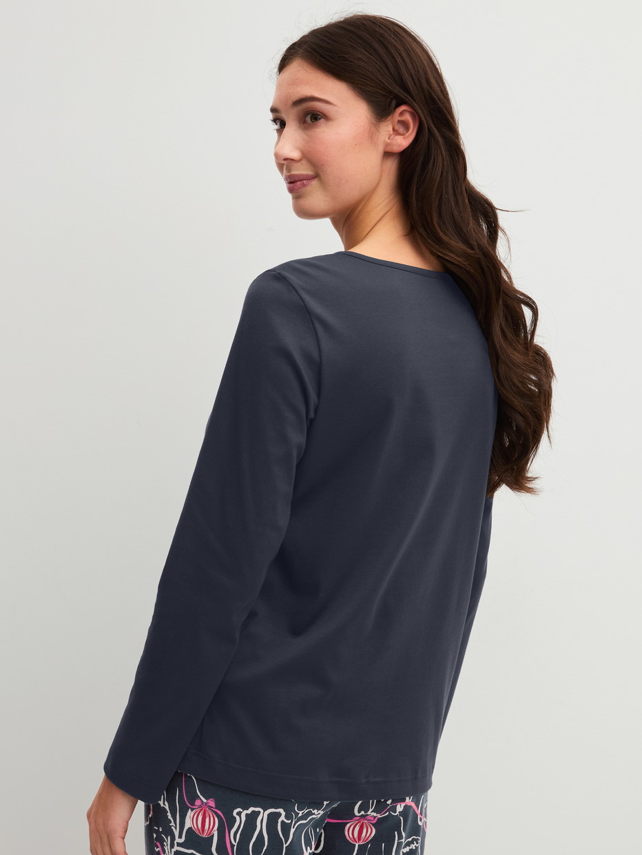 Women model is wearing Shirt long-sleeve made of 100% Cotton in Blue, Unicoloured from the PJ Party M&M series by CALIDA, Back view