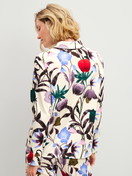 Women model is wearing Long-sleeve shirt with buttons made of 100% Cotton in Beige, Floral from the Alpine M&M series by CALIDA, Back view