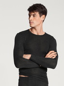 Men model is wearing Wool-silk long-sleeved shirt made of Wool in Blue, Unicoloured from the Wool & Silk series by CALIDA, Front view