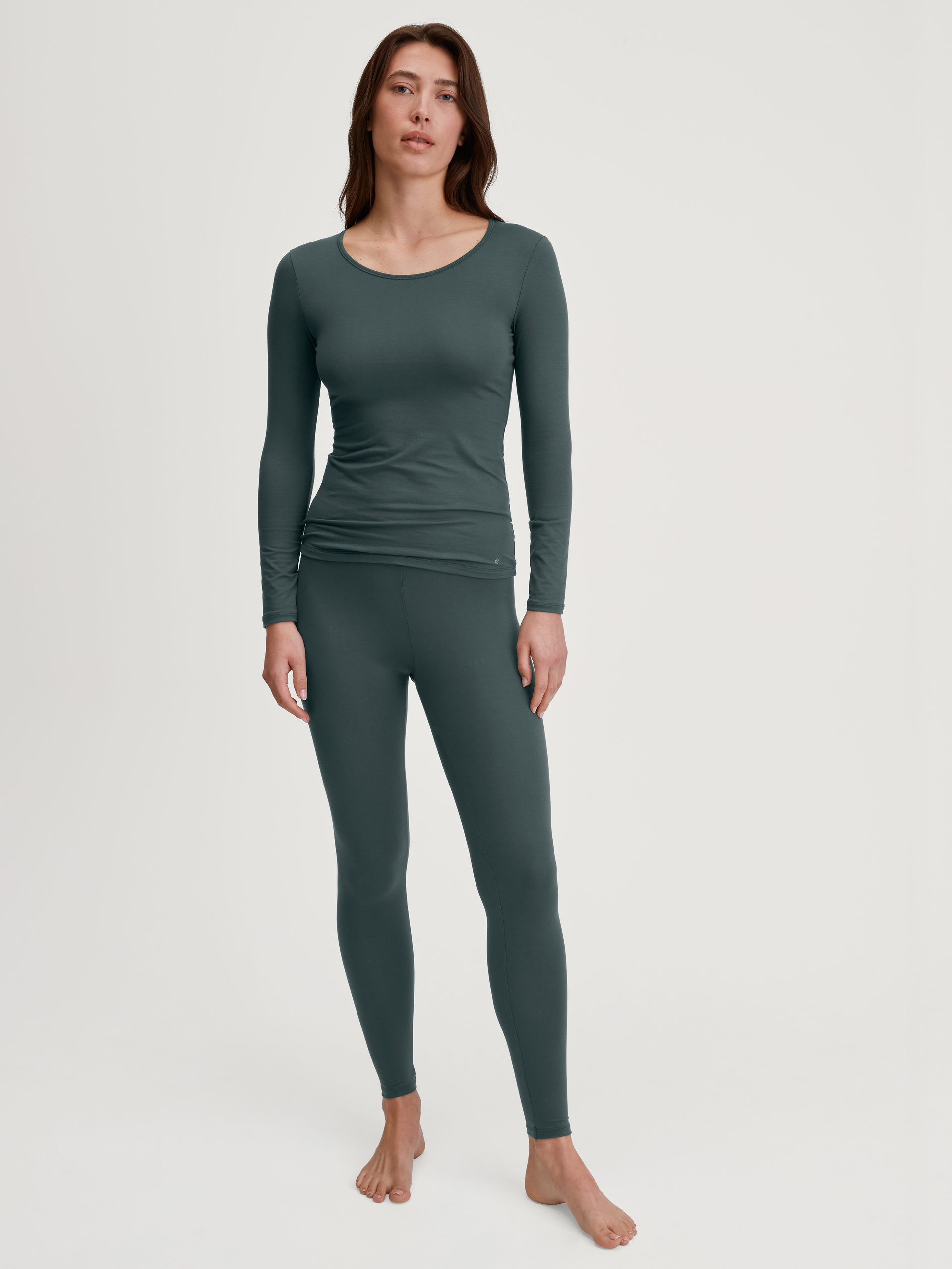 Women model is wearing Shirt long sleeve made of Cotton in Green, Unicoloured from the Natural Comfort series by CALIDA, Outfit