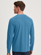 Men model is wearing Shirt long sleeve made of 100% Cotton in Blue, Unicoloured from the RMX Sleep Leisure series by CALIDA, Back view