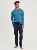 Men model is wearing Shirt long sleeve made of 100% Cotton in Blue, Unicoloured from the RMX Sleep Leisure series by CALIDA, Outfit