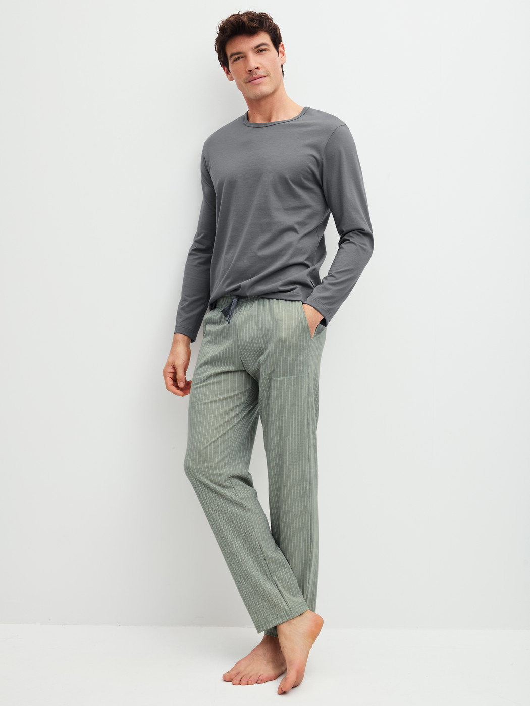 Men model is wearing Shirt long sleeve made of 100% Cotton in Grey, Unicoloured from the RMX Sleep Leisure series by CALIDA, Outfit