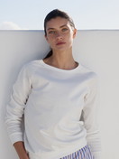 Women model is wearing Long-sleeve shirt with raglan sleeves made of 100% Cotton in White, Unicoloured from the Favourites Sleep series by CALIDA, Front view