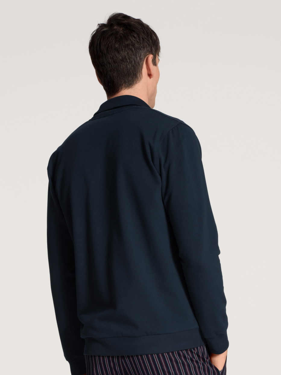 Le mannequin Homme porte le/la Veste en Coton de couleur Bleu, Unicolore, de la série Remix Basic Lounge de CALIDA, Vue arrière