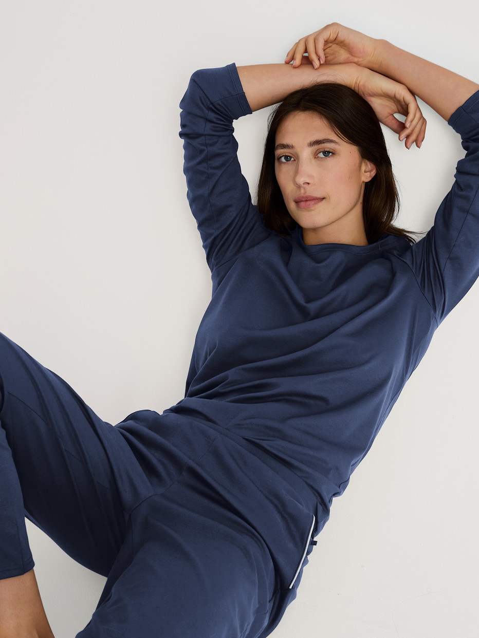 Women model is wearing Shirt long sleeve made of 100% Cotton in Blue, Floral from the Favourites Sleep series by CALIDA, Additional Image