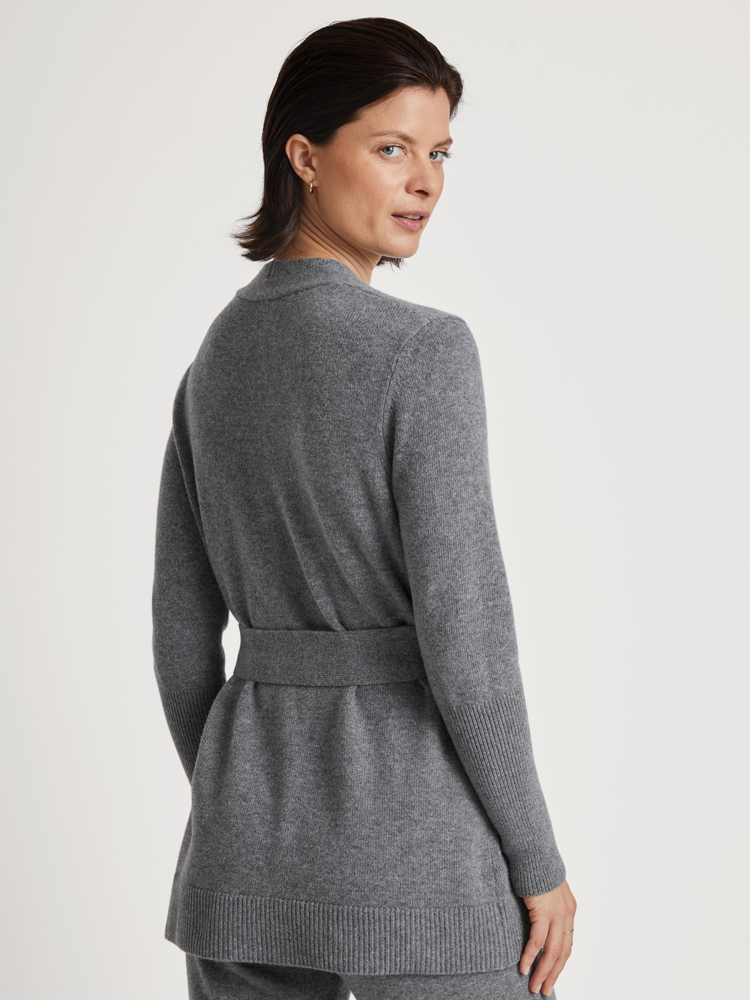 Women model is wearing Cardigan made of merino wool made of Wool in Grey, Unicoloured from the The Cosy Collection series by CALIDA, Back view
