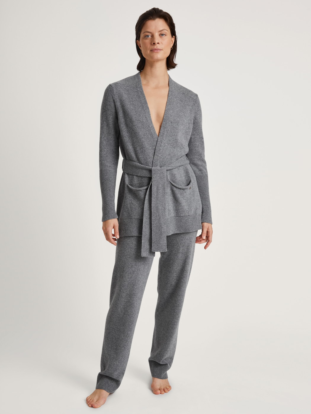 Women model is wearing Cardigan made of merino wool made of Wool in Grey, Unicoloured from the The Cosy Collection series by CALIDA, Outfit