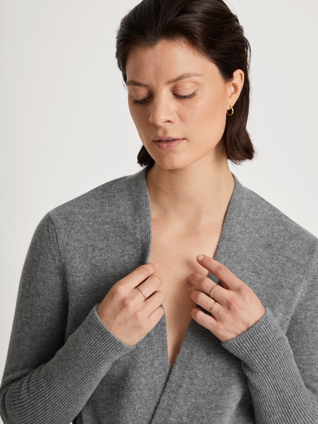 Women model is wearing Cardigan made of merino wool made of Wool in Grey, Unicoloured from the The Cosy Collection series by CALIDA, Detail