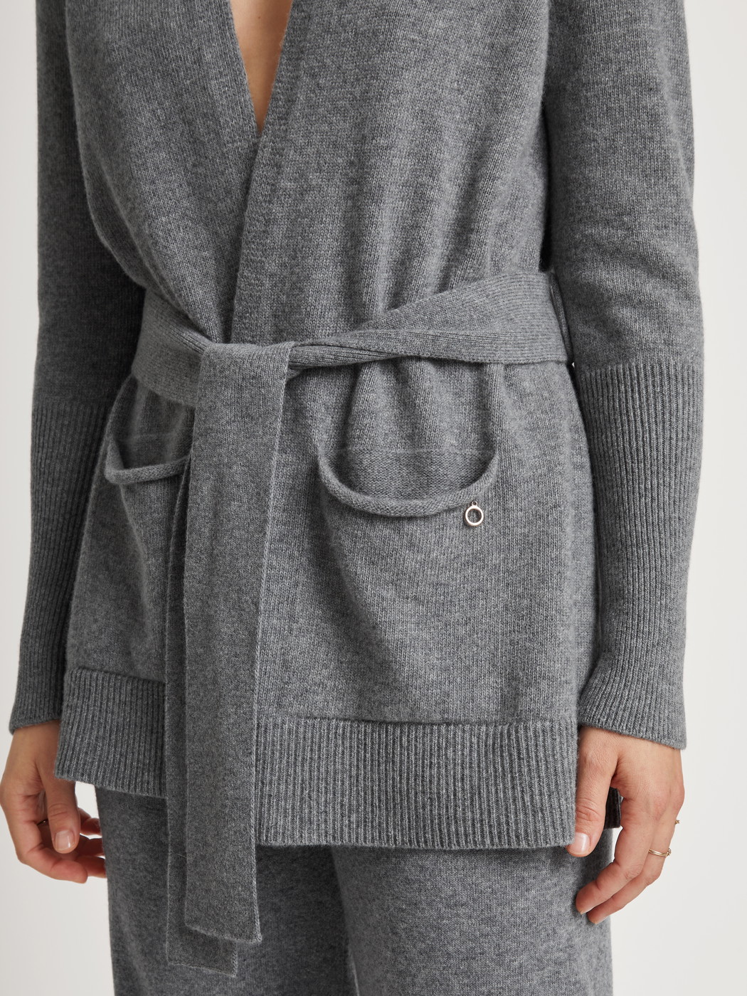 Women model is wearing Cardigan made of merino wool made of Wool in Grey, Unicoloured from the The Cosy Collection series by CALIDA