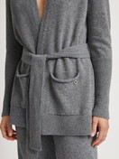 Women model is wearing Cardigan made of merino wool made of Wool in Grey, Unicoloured from the The Cosy Collection series by CALIDA