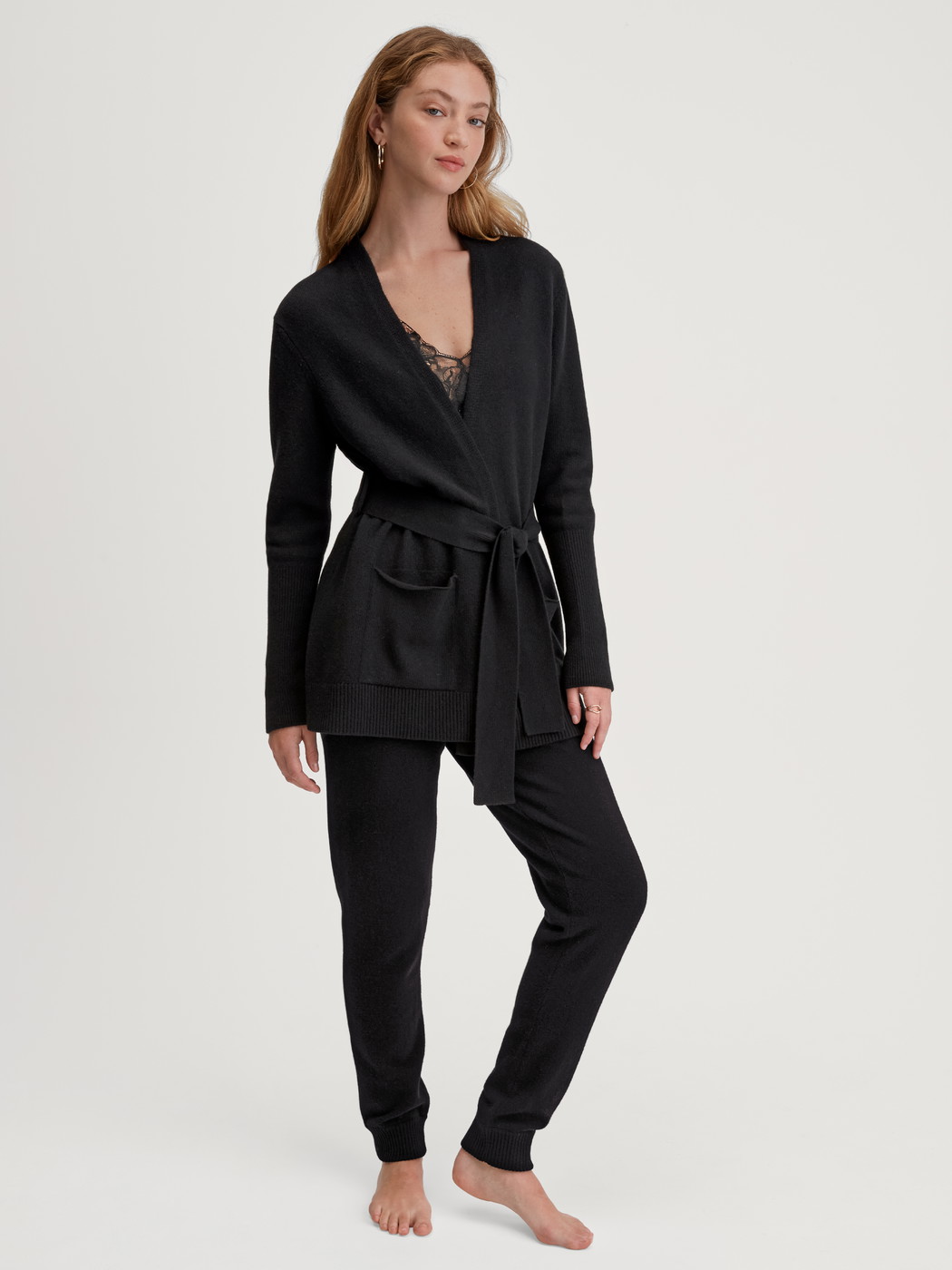 Women model is wearing Cardigan made of merino wool made of Wool in Black, Unicoloured from the The Cosy Collection series by CALIDA, Outfit