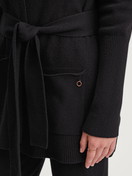 Women model is wearing Cardigan made of merino wool made of Wool in Black, Unicoloured from the The Cosy Collection series by CALIDA, Detail