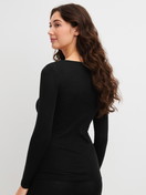 Damen-Model trägt Langarm-Shirt aus Wolle-Seide aus Wolle in Schwarz, Einfarbig aus Serie True Confidence von CALIDA, Rückansicht